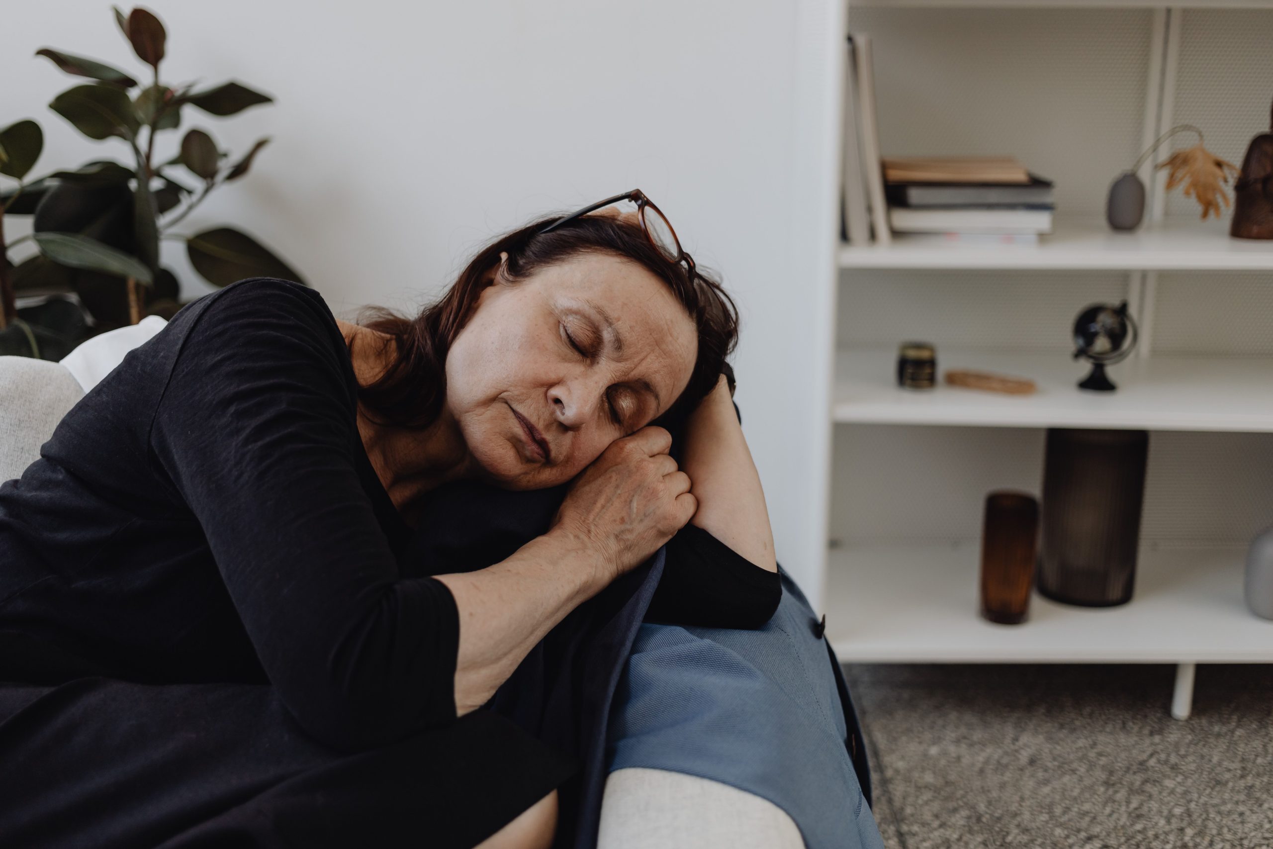 A woman sleeping on the sofa
